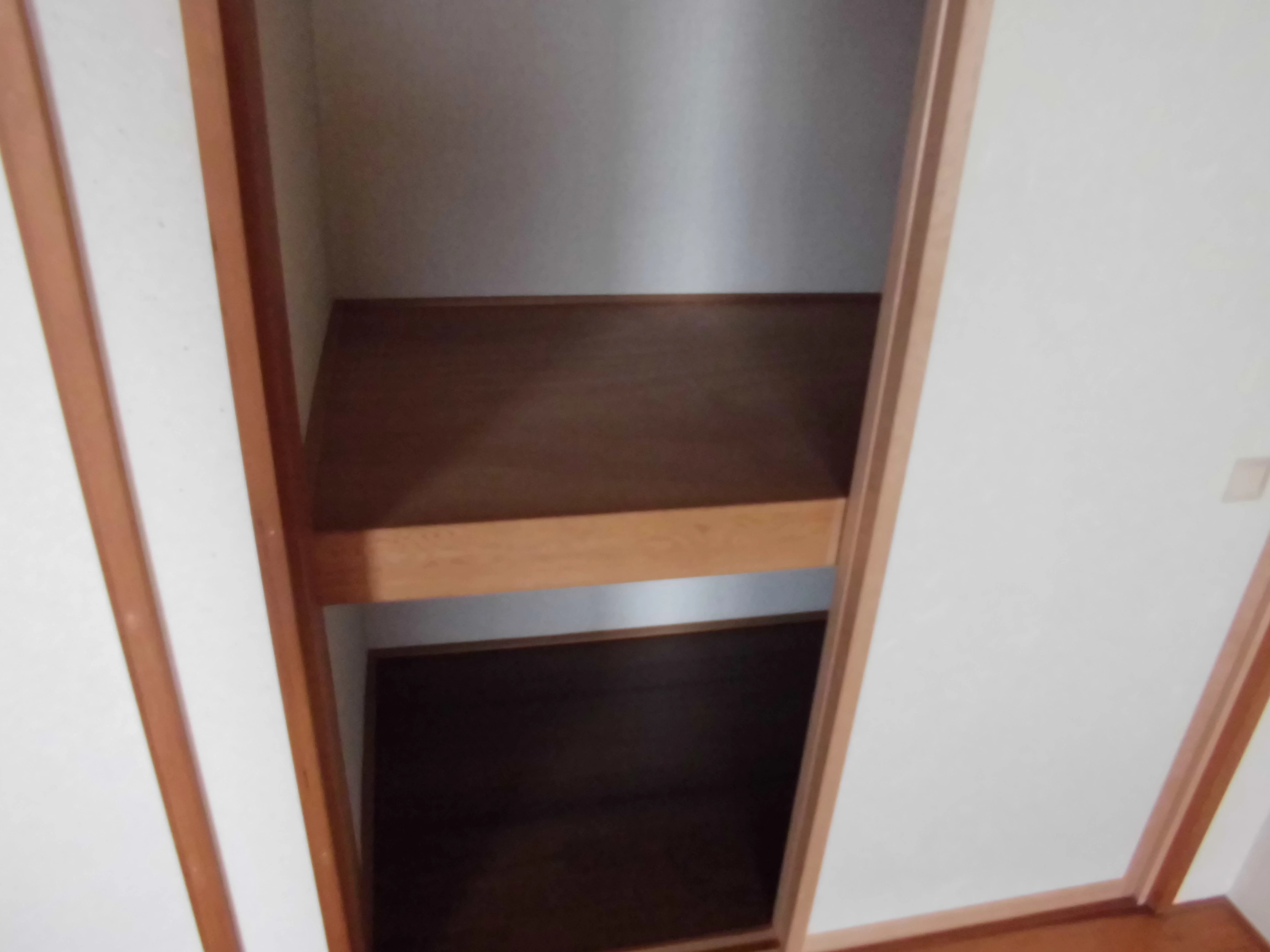 押入